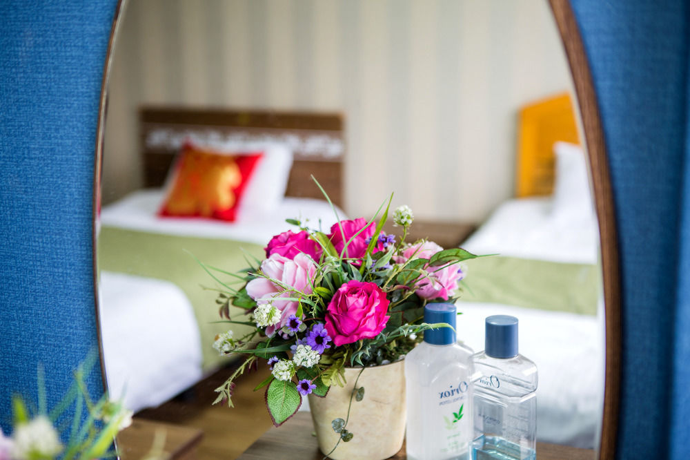 Alps Hotel Jeju Bagian luar foto